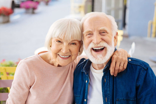 Strong relationships. Gay senior couple making laugh and looking at camera