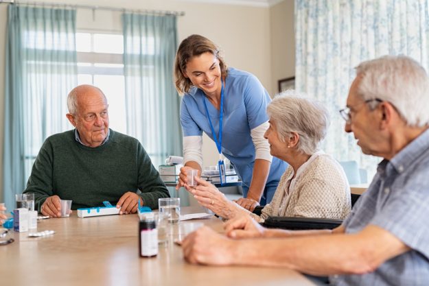 Lovely nurse giving medicine to senior woman at care facility What Does Luxury Assisted Living Look Like In Houma, LA?