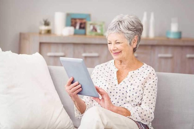 Senior woman using digital tablet
