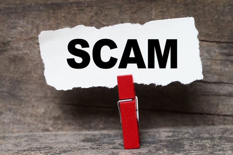 Business Concept: SCAM word