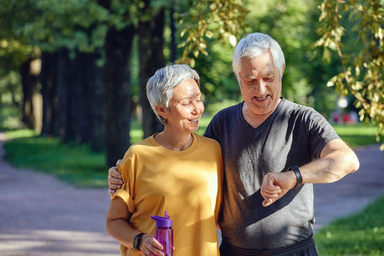 Active sporty retired spouses lifestyle using modern tech