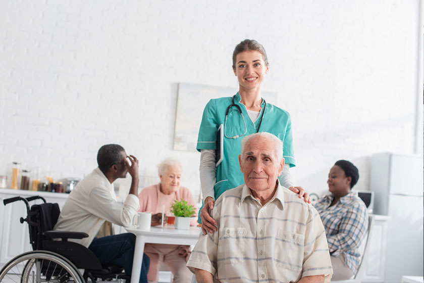 Smiling nurse looking at camera
