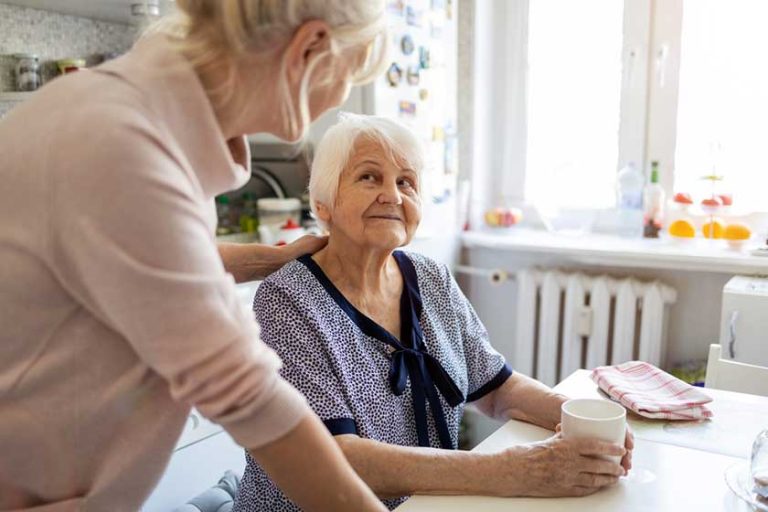 Woman spending time with her elderly mother