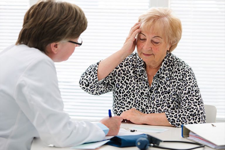 Doctor with senior patient