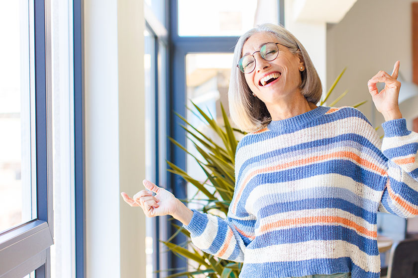 Middle Age Woman Smiling Feeling Carefree Relaxed and Happy Middle Age Woman Smiling Feeling Carefree Relaxed and Happy