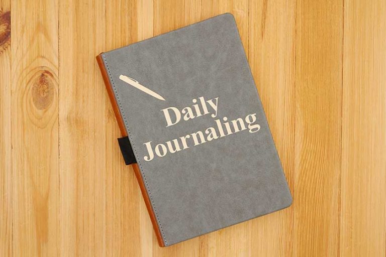Daily journaling message with a pen icon written