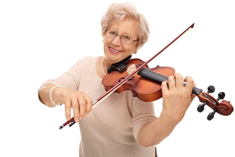 Mature woman playing violin