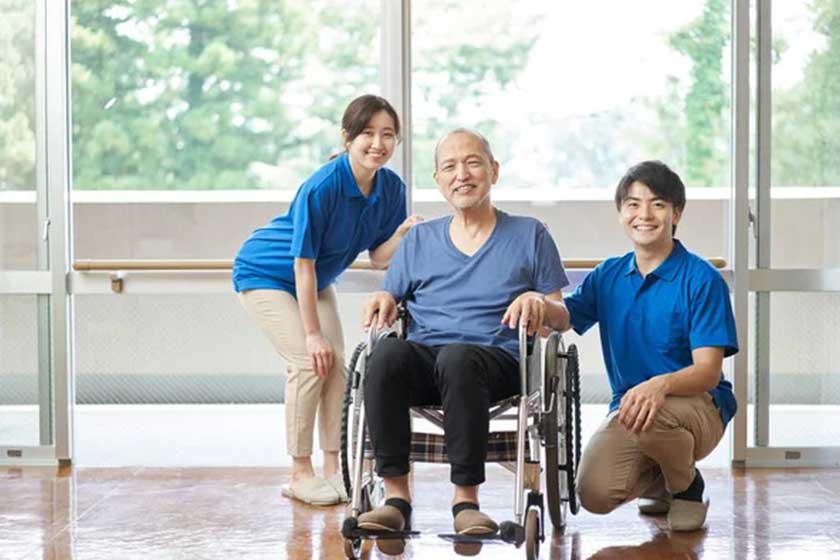 Asian elderly and male and female caregivers Asian elderly and male and female caregivers