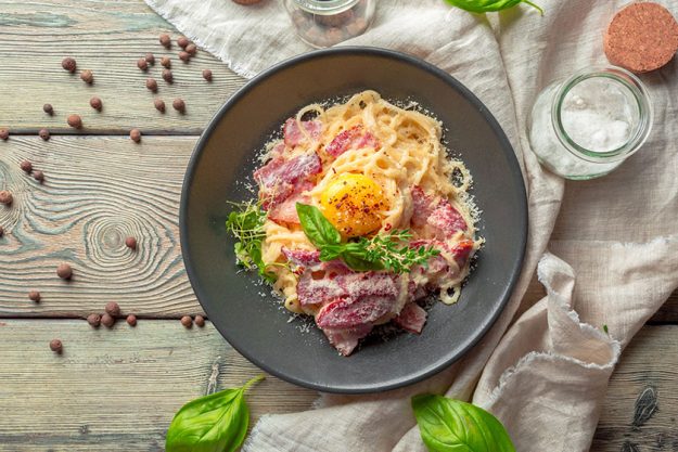 Pasta Carbonara. Spaghetti with bacon, parsel and parmesan cheese Pasta Carbonara. Spaghetti with bacon, parsel and parmesan cheese