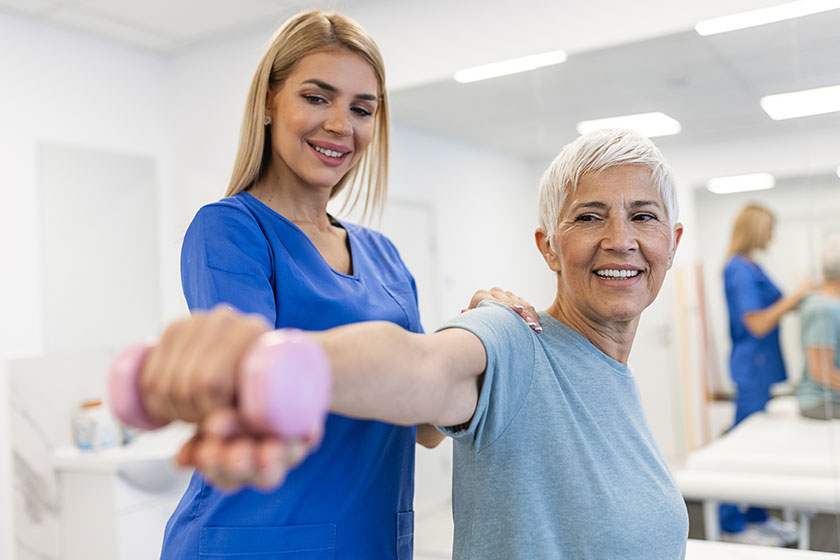 Professional therapists is stretching muscles, senior patient with abnormal muscular symptoms, physical rehabilitation therapies and treatment of physiological disorders by physiotherapists concept