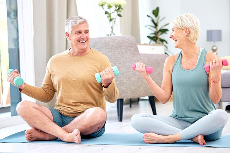 Fitness, senior and couple with dumbbell