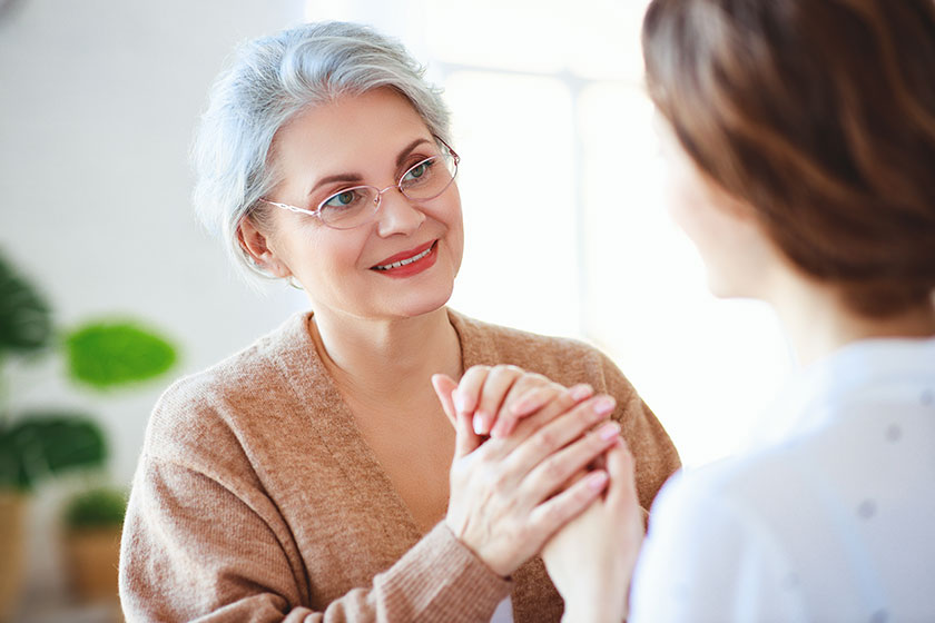 happy family two generations old mother and adult daughter