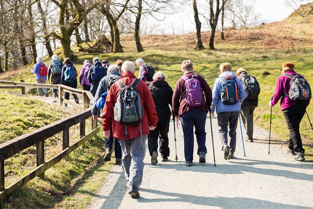 lake district march 2022 group senior walkers taking energetic walk lake district march 2022 group senior walkers taking energetic walk