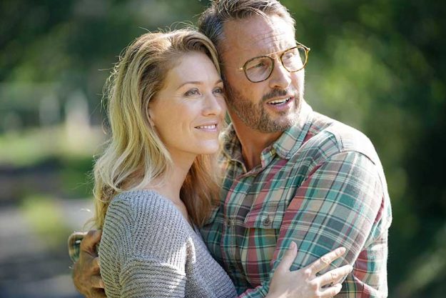 portrait mature couple enjoying sunny day nature