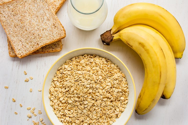 healthy breakfast with oatmeal banana dry bread and milk