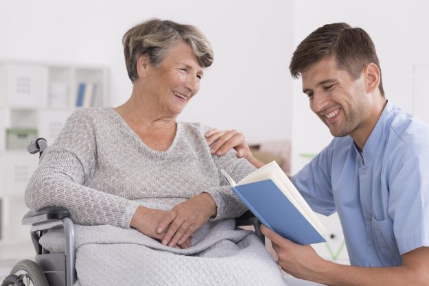 Smiled,Senior,Woman,On,Wheelchair,Smiling,To,Her,Nurse,,Who Smiled,Senior,Woman,On,Wheelchair,Smiling,To,Her,Nurse,,Who