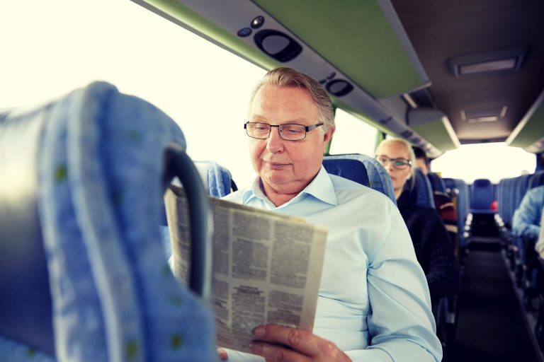 Transport,,Tourism,,Trip,And,People,Concept, ,Senior,Man,Reading