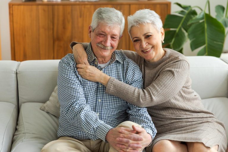 Senior adult mature couple hug