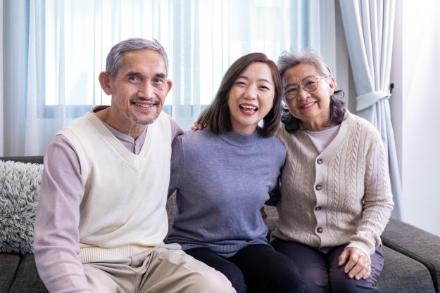 Asian family portrait consist of senior father mother and daught