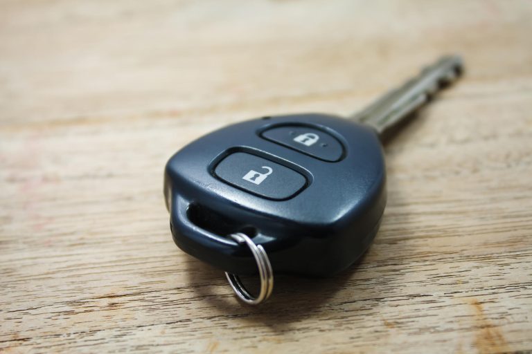 Car key on wooden background