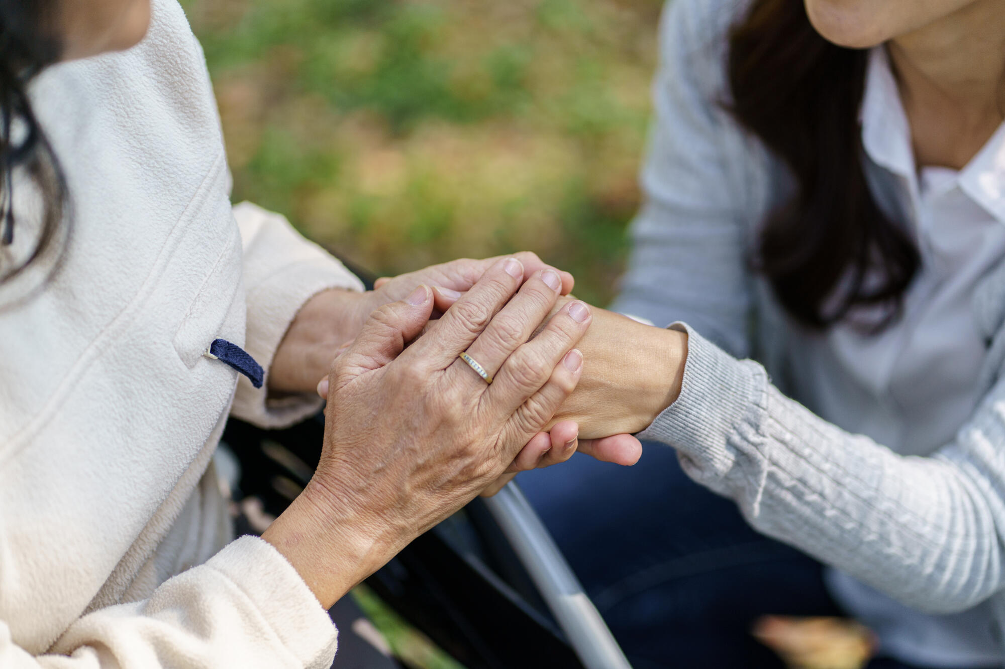 Family relationship Asian senior woman in wheelchair with happy