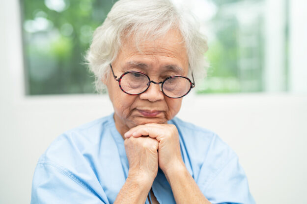 Asian senior woman wearing eyeglasses or vision glasses at home