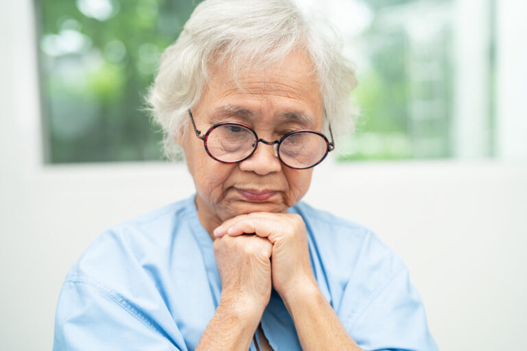 Asian senior woman wearing eyeglasses or vision glasses at home