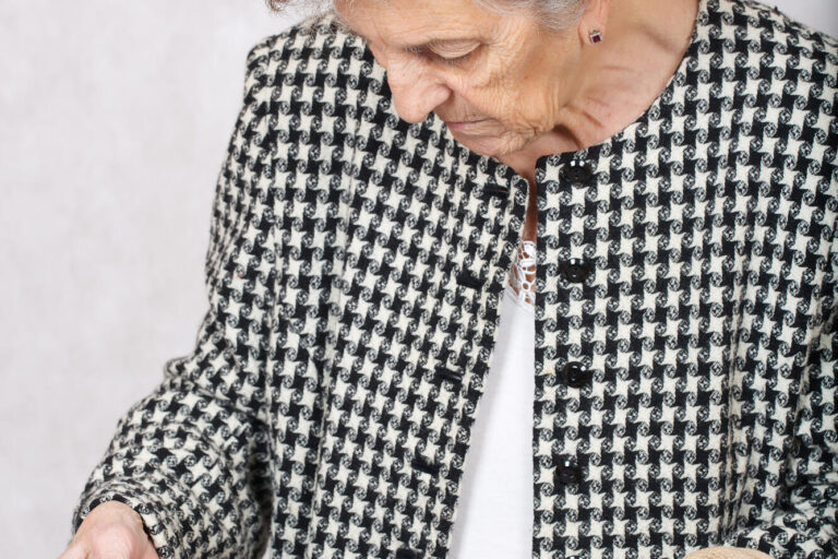 Old woman with shopping bags