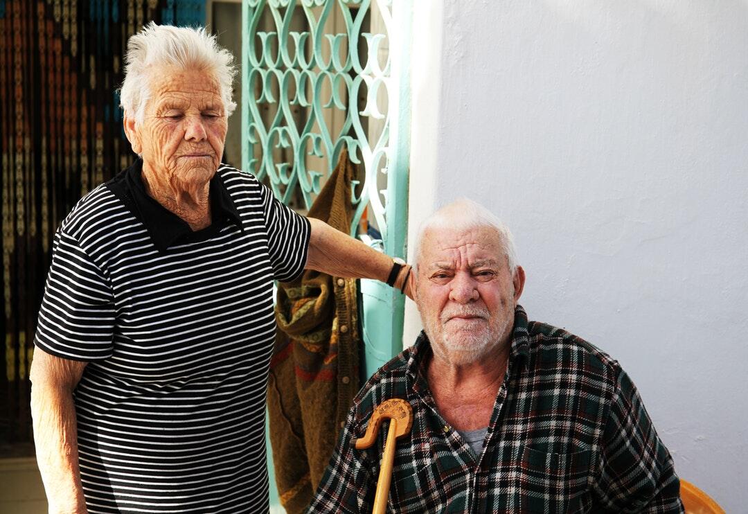 man sitting on the chair besid man sitting on the chair besid