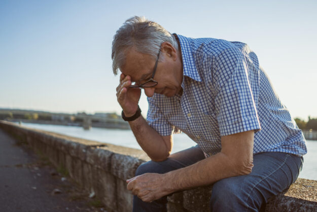 Worried senior man outside Worried senior man outside