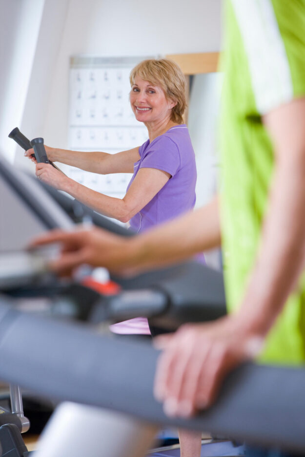 A,Senior,Woman,Smiling,At,The,Camera,Under,Selective,Focus