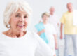 Active,Senior,Woman,Smiling,,Group,Of,Sporty,Elderly,People,In