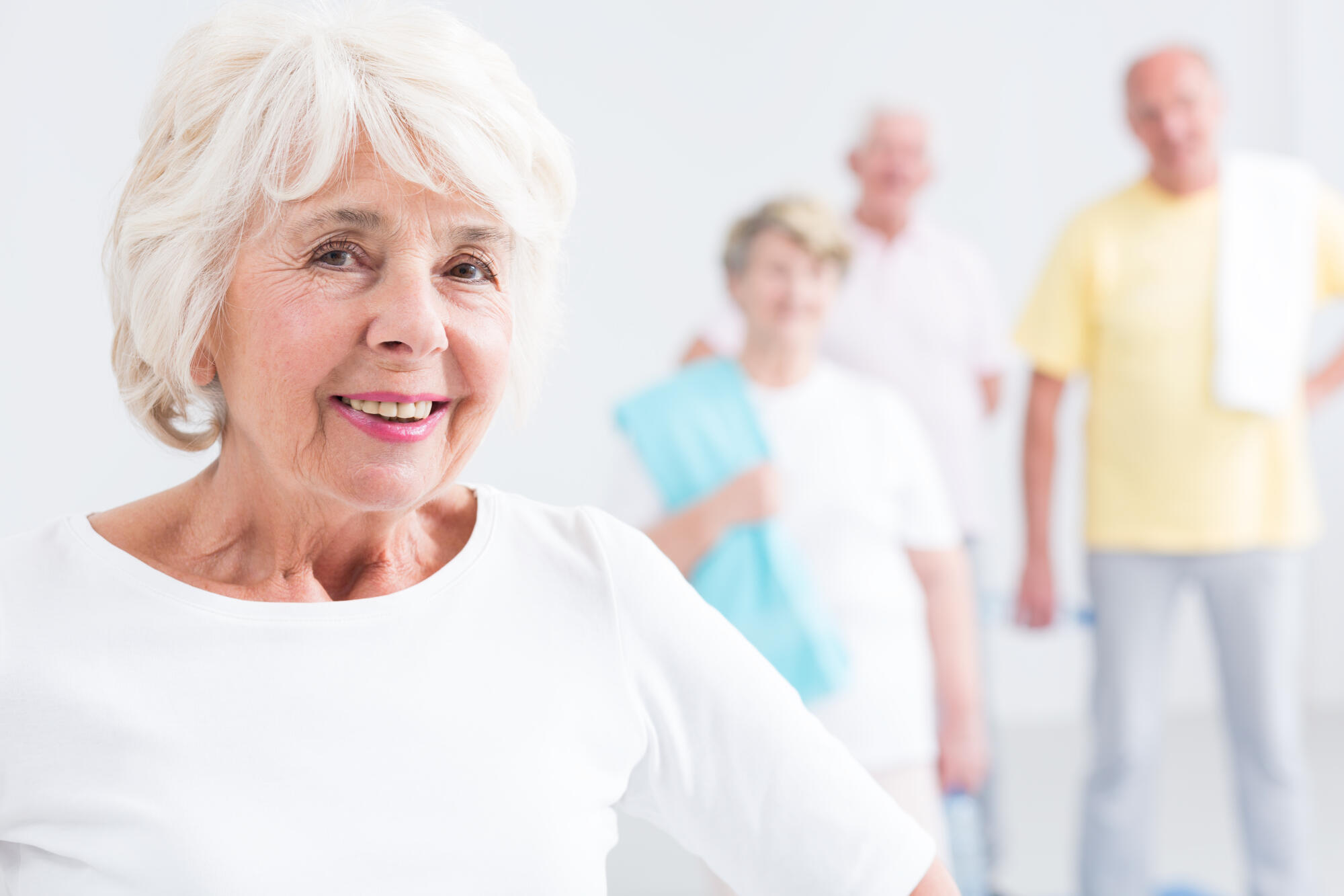 Active,Senior,Woman,Smiling,,Group,Of,Sporty,Elderly,People,In Active,Senior,Woman,Smiling,,Group,Of,Sporty,Elderly,People,In